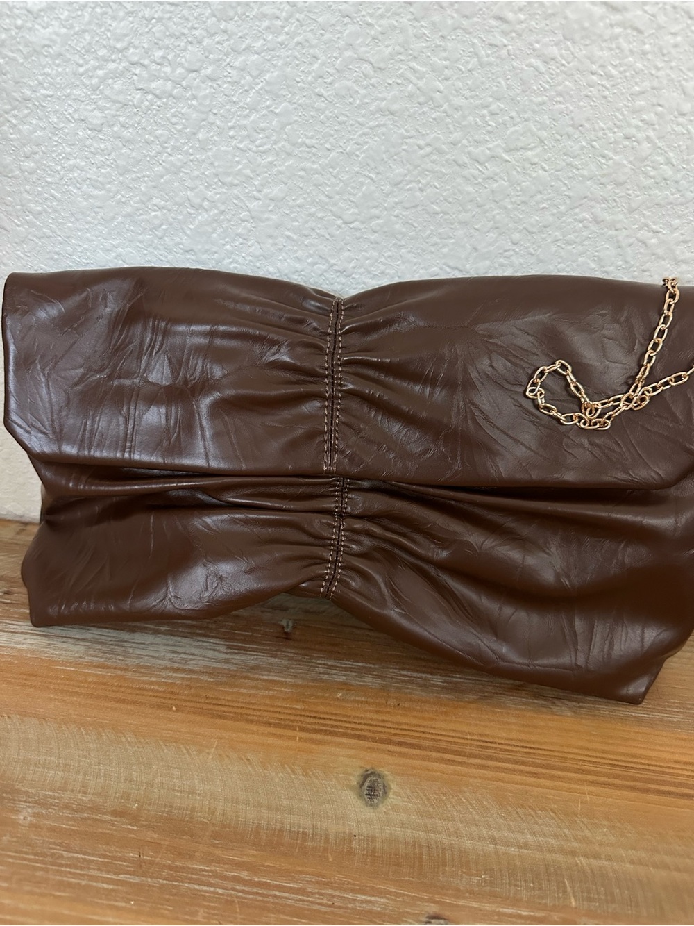Brown Leather-Look Ruched Clutch with Gold Chain